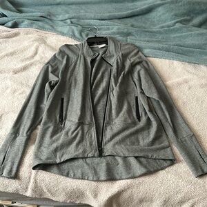 Cabi athleisure jacket. Size Large with zipper pockets.